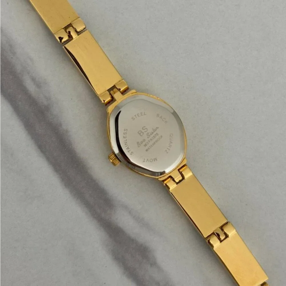 Sku‎ : 0451 cute gold mini watch bracelet with brown Inserts with marble pattern